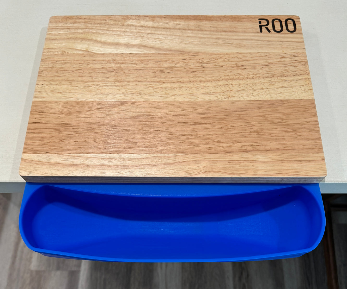 ROO - the unique Silicone Cutting Board Mat with a Scrap Pouch