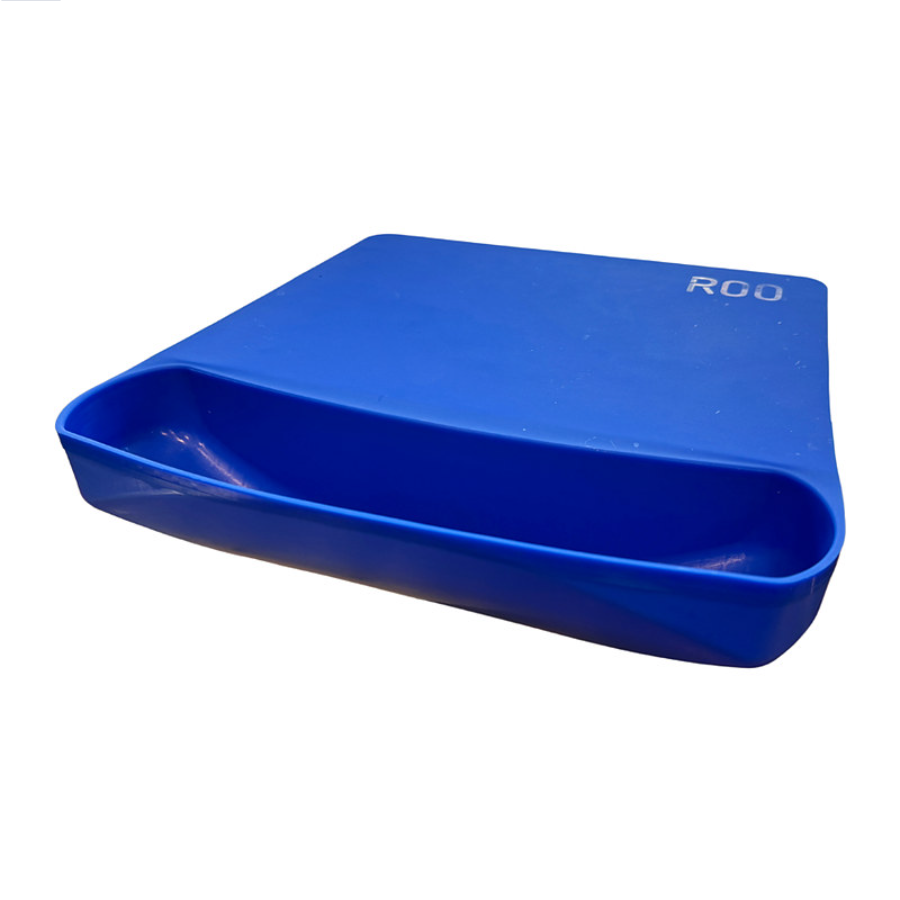 The blue ROO silicone mat, angled to show the scrap pouch